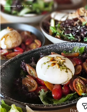 Burrata salad with cherry tomatoes and greens