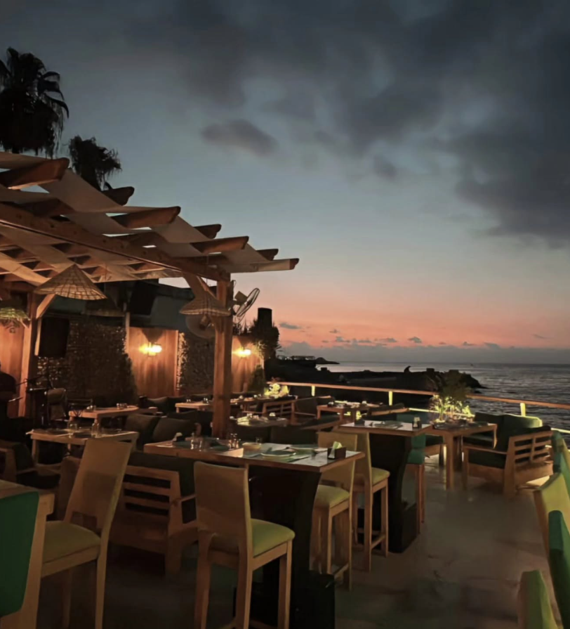 Portofino Beach Bar terrace at dusk, overlooking the sea in Jounieh